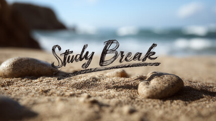 study break written in sand on beach with ocean waves in background 