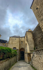 Castle of Sedan, Sedan, Rethel, Ardennes, Grand-Est, France, August, 28th, 2025, A beautifully picturesque view depicting an old stone building set against a dramatically stunning sky above