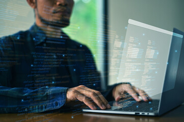 Professional programmer coding modern software using advanced digital technology in a high-tech workspace. Concept of software development, programming, coding, innovation digital business