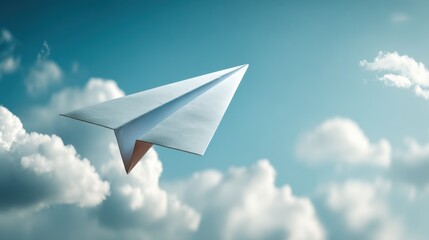 A sleek paper airplane glides through a bright blue sky dotted with fluffy clouds. This image captures childhood creativity and the freedom of imaginative flight.