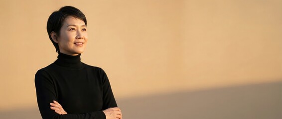 Asian senior woman smiling, looking up with arms crossed Confident, serene, thoughtful, professional, outdoors