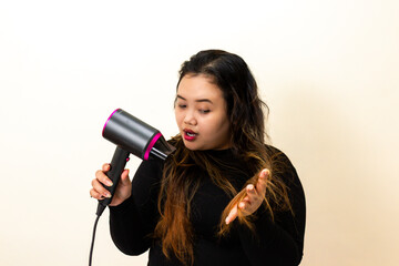 Woman Drying Hair with Hairdryer, Concerned Expression, Split Ends Visible