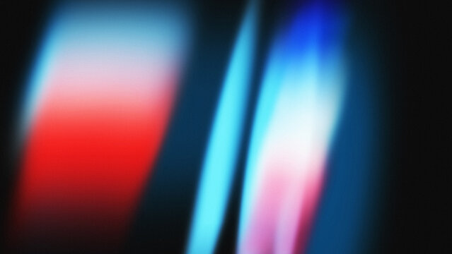 Abstract blurred red and blue light leak background with film grain