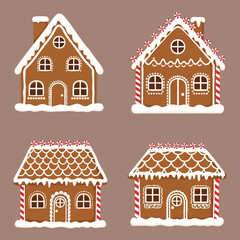 Fototapeta premium Four charming gingerbread houses decorated with festive icing and candy details arranged on a warm brown background perfect for holiday designs