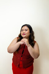 Asian Woman in Red Vest and Skirt Doing Traditional Greeting Gesture