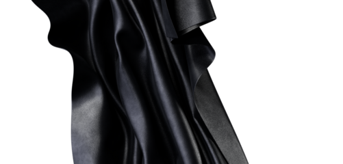 Close up of black fabric creating a smooth flowing texture with light and shadows. Perfect for design and background.