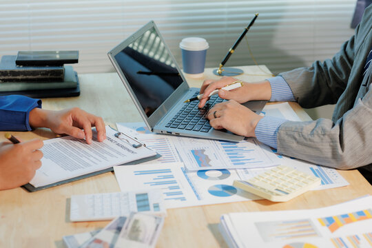 Corporate team discussing market data. Collaborative effort for business - Powered by Adobe