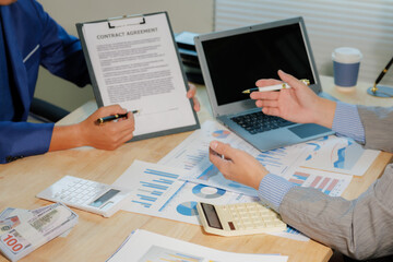 Corporate team discussing market data. Collaborative effort for business