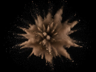 Brown powder explosion on black background