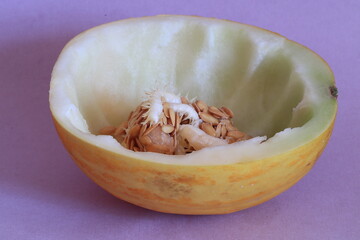 The pulp was removed from the melon with a spoon.
