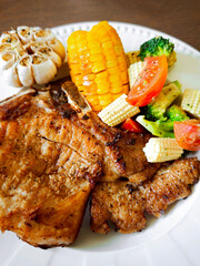 Pork chop steak with mixed vegetables