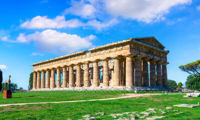 Fototapeta premium The ancient Greek temple of Hera in Paestum, Italy. Famous archaeological site of Paestum, Magna Graecia, ancient ruins.