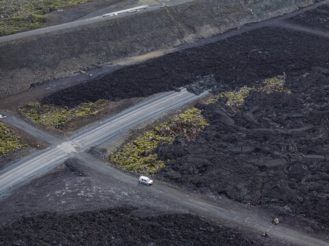 Lava, lava field, road, destroyed, summer, cloudy, sunny, aerial view, Blue Lagoon, Sundhn&uacute;kur crater series, Fagradalsfjall, Reykjanes, Iceland