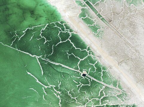 Detail of a toxic phosphogypsum waste pond in the vicinity of the town of Huelva. Aerial view. Drone shot. Huelva province, Andalusia, Spain