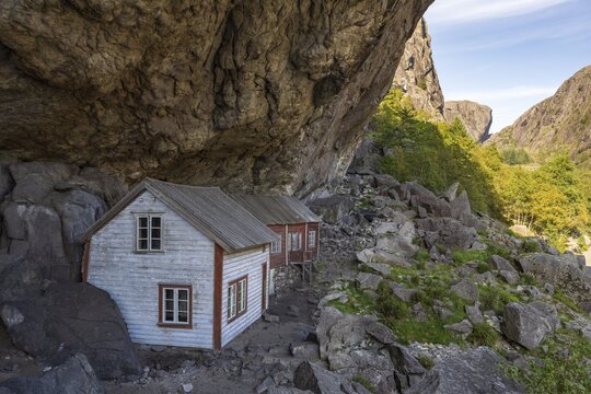 Helleren, houses under rock face, J&oslash;ssingfjord, Sokndal, Rogaland, Norway