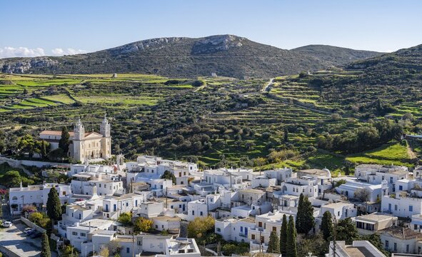 View over the village of Lefkes with white Cycladic houses, town view with church of Agia Triada, Church of the Holy Trinity of Lefko, Lefkes, Cyclades, Greece