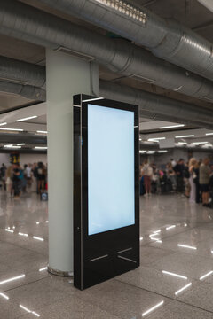Digital screen in modern airport terminal setting