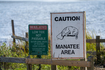 Close up of Sign Urging Caution because of the presence of Manatees