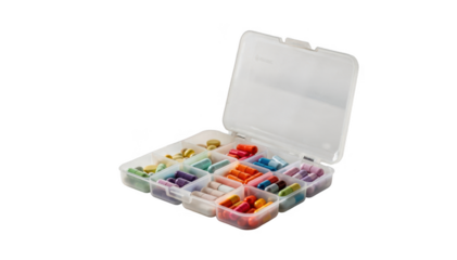 Closeup of a nonbranded daytime pill organizer with colorful tablets on a white bedside table accompanied by a clear water glass isolated on a white background.