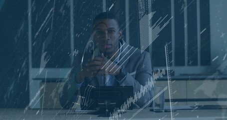 Sitting executive in suit and tie checking smartphone in boardroom with phone and chart overlays
