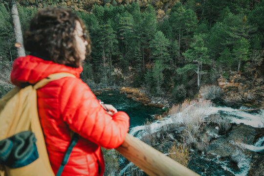 Woman hiking in Alto Tajo, Guadalajara, Spain
