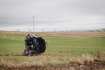 Car accident with overturned vehicle in deserted area