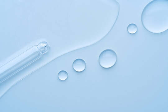 Gel drops with clear liquid and glass dropper