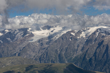 Panoramic alpine viewpoint from Pic Blanc at 3300 meters near Alpe d’Huez in the Grandes Rousses...