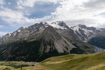 Fototapeta premium Mountain landscape in the Arves Massif, French Alps, with the iconic La Meije peak in the background.
