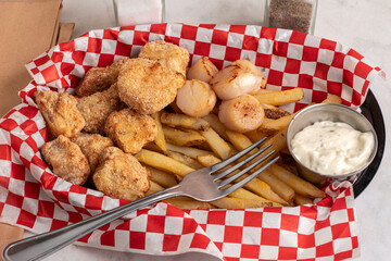 cod bites with scallops and  french fries