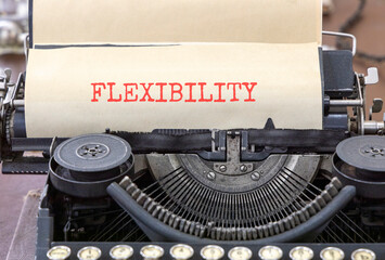 Flexibility symbol. Concept word Flexibility typed on beautiful old retro typewriter. Beautiful white paper background. Business flexibility concept. Copy space.