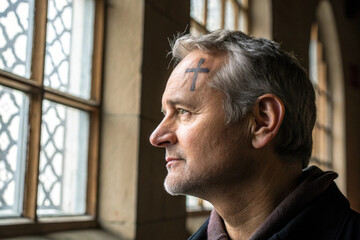 Close-Up Ash Cross on Middle-Aged Man's Forehead Symbolizing Repentance
