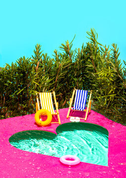 Colorful poolside setup with heart-shaped swimming pool