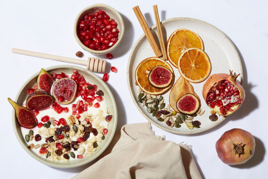 Natural yogurt bowl with figs and pomegranate