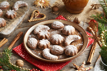Homemade traditional Czech Christmas cookies called pracny on a brown plate
