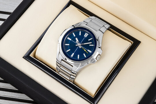 Stylish men&rsquo;s wrist watch with metallic strap, blue face, chronograph and calendar in box