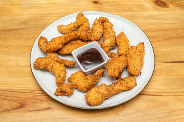 whether as a main course with coleslaw and cornbread, or as an appetizer on a charcuterie board, chicken fingers demonstrate their adaptability and universal appeal
