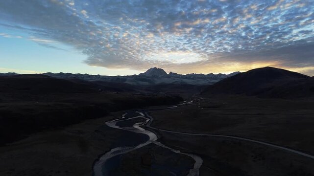 Sunrise Aerial footage of Yala Snow Mountain in Sichuan