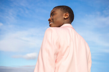 Confident businesswoman portrait with a clear sky