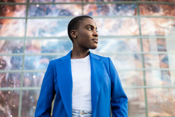 Confident CEO in blue jacket looking forward