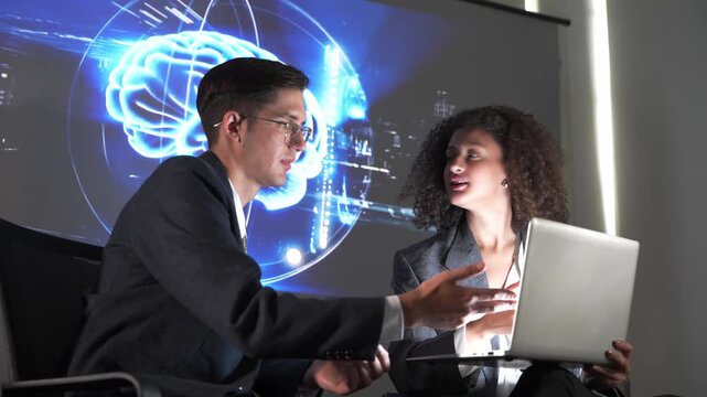 Discussion on technology and innovation between two professionals in an office