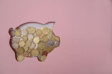 Piggy bank savings concept with copy space, handmade paper cutting