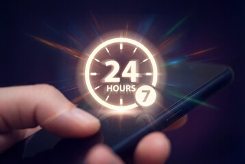 Hand holding smartphone with glowing 247 clock icon on screen