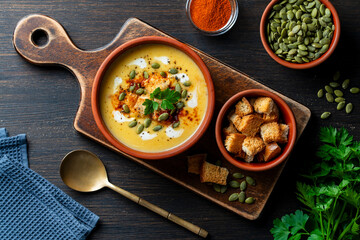 Creamy Pumpkin Soup with Croutons and Seeds