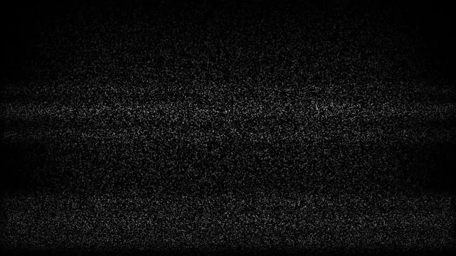 Television turn on off noisy static screen in monochrome flickers vintage effect. Suitable for retro, technology, noise, vintage concepts