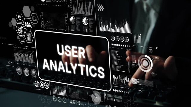 Hands Typing on Keyboard with User Analytics Data Visualization and Graphs on Screen in Modern Office Environment. Asymptotic smart data analytic.