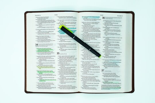 Highlighter Marker Pen On Open Bible - Powered by Adobe