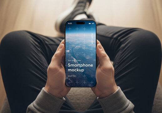 High angle view of a smartphone user