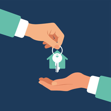 Handing over a house key symbolizing property transfer and new beginnings