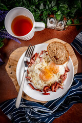 Fried egg and sliced sausage.